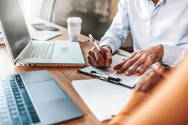 Professional reviewing insurance policy documents